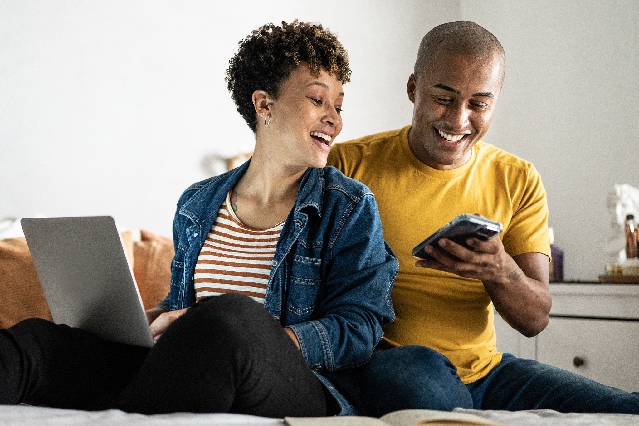 Two people looking at phone